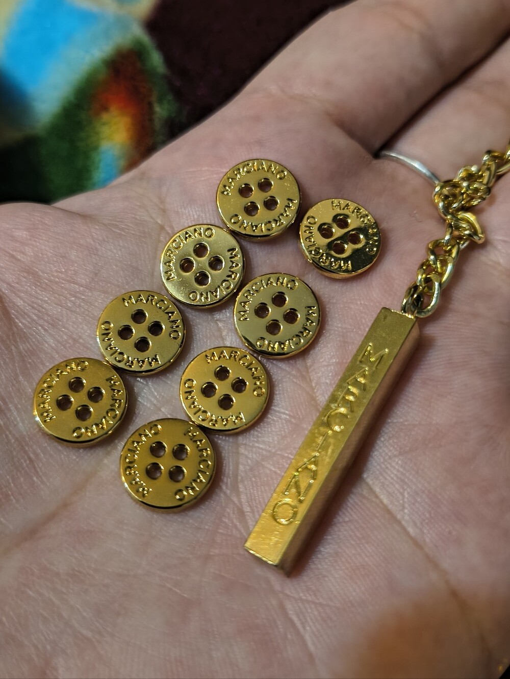 Marciano Gold Plated 8 Piece Button and Bar Tag Embellishment Set